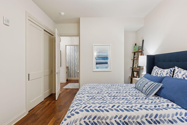 935 Lake St E Unit 211, Wayzata, MN 55391 - bedroom with dark wood-style flooring and baseboards