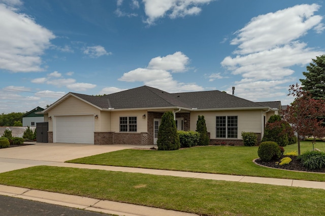 106 9th Ave SE, Kasson, MN 55944 - view of front of house featuring brick siding, an attached garage, concrete driveway, a front yard, and a shingled roof
