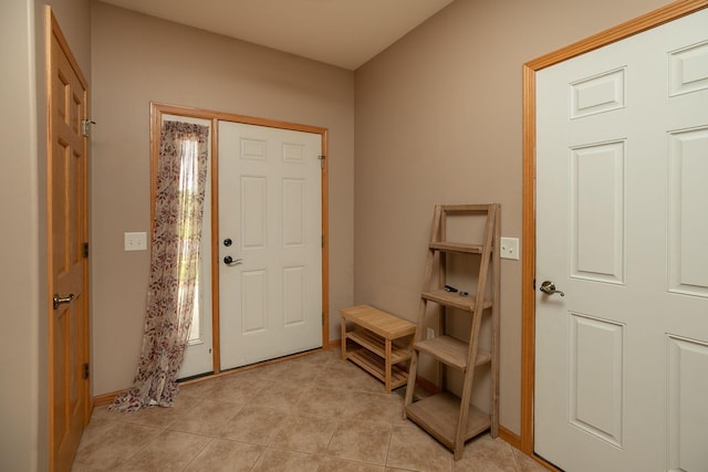 106 9th Ave SE, Kasson, MN 55944 - foyer entrance featuring light tile patterned floors and baseboards