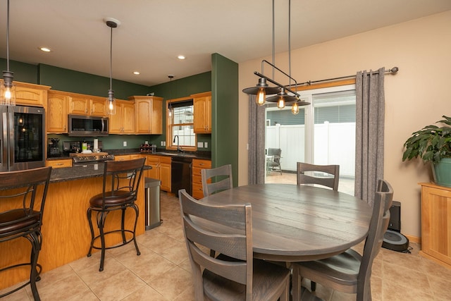 106 9th Ave SE, Kasson, MN 55944 - dining area with light tile patterned flooring and recessed lighting