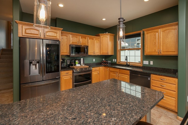 106 9th Ave SE, Kasson, MN 55944 - kitchen featuring appliances with stainless steel finishes, a sink, recessed lighting, hanging light fixtures, and light tile patterned floors