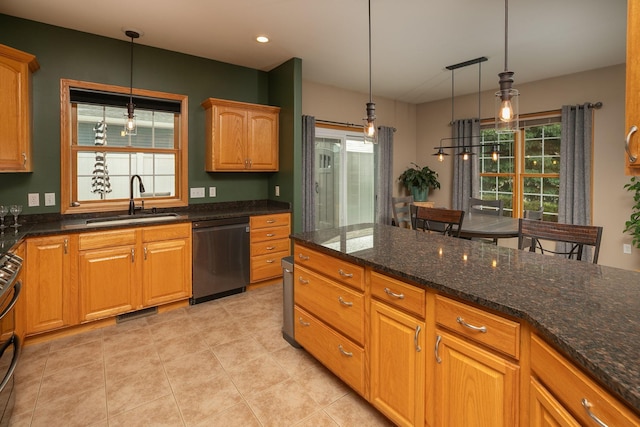 106 9th Ave SE, Kasson, MN 55944 - kitchen featuring dishwashing machine, a sink, hanging light fixtures, light tile patterned floors, and dark stone counters