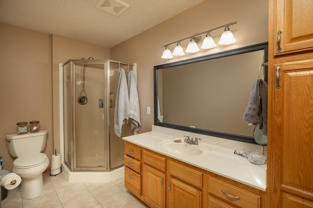 106 9th Ave SE, Kasson, MN 55944 - full bath with tile patterned flooring, toilet, vanity, and a stall shower