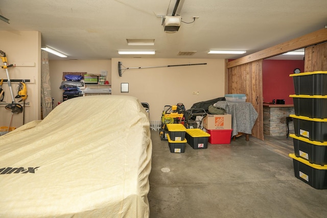 106 9th Ave SE, Kasson, MN 55944 - garage with a garage door opener