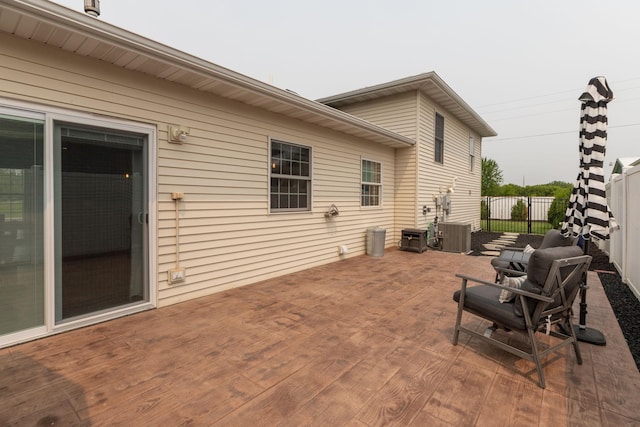 106 9th Ave SE, Kasson, MN 55944 - fenced backyard featuring a wooden deck