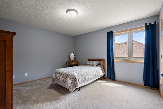 3321 Willie Dr, Burnsville, MN 55337 - bedroom with carpet floors, a textured ceiling, and baseboards