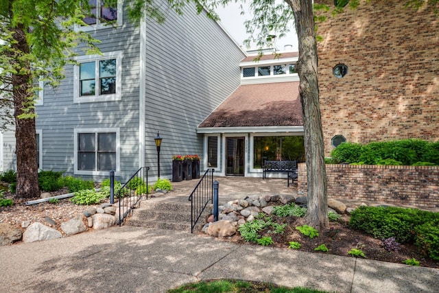 3020 Saint Albans Mill Rd Unit 309, Minnetonka, MN 55305 - rear view of house featuring a patio area