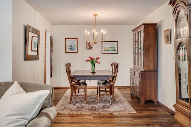 3020 Saint Albans Mill Rd Unit 309, Minnetonka, MN 55305 - dining space with a chandelier, dark wood-style floors, and baseboards