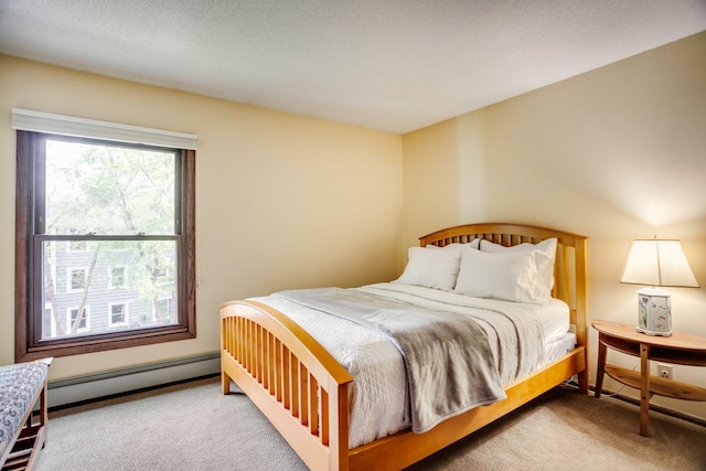 3020 Saint Albans Mill Rd Unit 309, Minnetonka, MN 55305 - bedroom with carpet flooring and baseboard heating