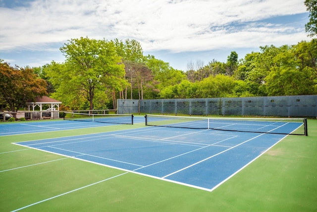 3020 Saint Albans Mill Rd Unit 309, Minnetonka, MN 55305 - view of tennis court featuring community basketball court
