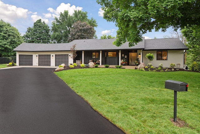 2324 Rivendell Ln, Minnetonka, MN 55305 - single story home with driveway, an attached garage, a front yard, a porch, and roof with shingles