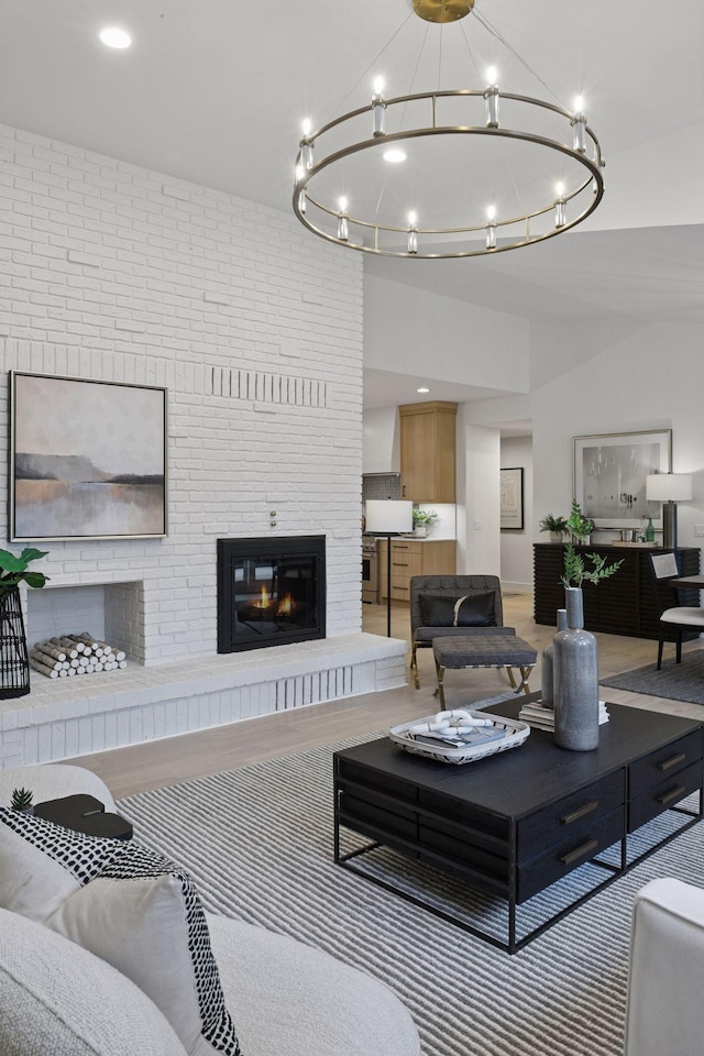 2324 Rivendell Ln, Minnetonka, MN 55305 - living room with a fireplace and a chandelier