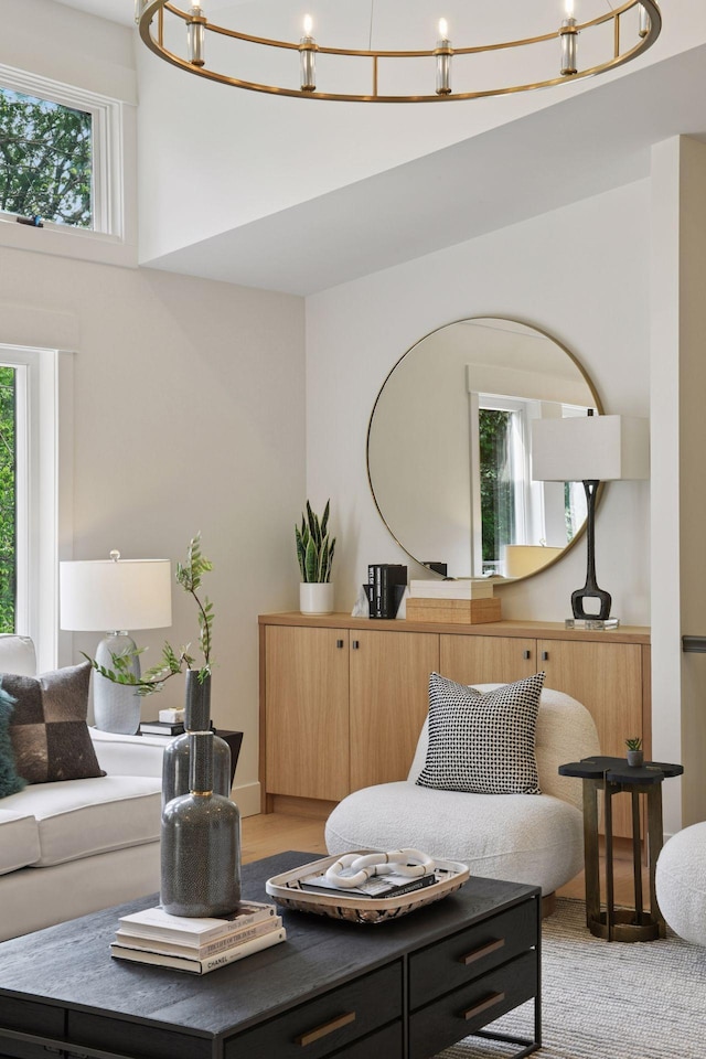 2324 Rivendell Ln, Minnetonka, MN 55305 - living room featuring a chandelier and healthy amount of natural light
