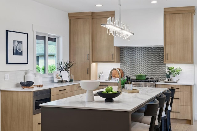 2324 Rivendell Ln, Minnetonka, MN 55305 - kitchen with tasteful backsplash, modern cabinets, recessed lighting, a kitchen bar, and pendant lighting