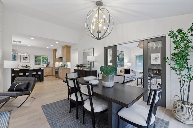 2324 Rivendell Ln, Minnetonka, MN 55305 - dining room featuring a chandelier, light wood finished floors, and recessed lighting