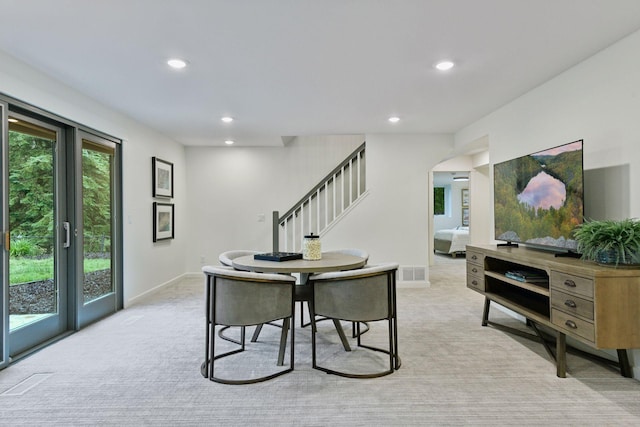 2324 Rivendell Ln, Minnetonka, MN 55305 - dining area featuring recessed lighting, stairs, and light carpet