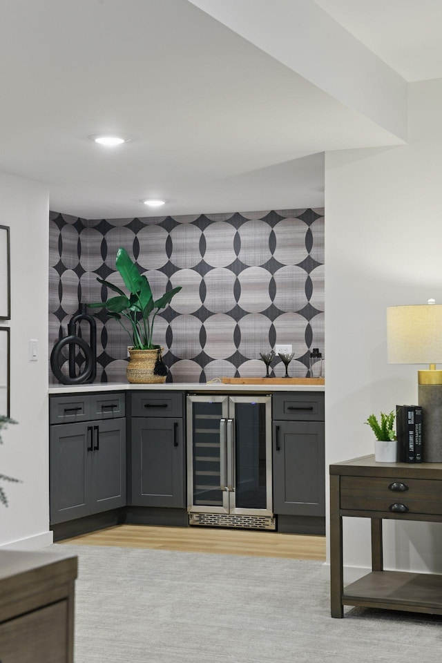 2324 Rivendell Ln, Minnetonka, MN 55305 - indoor bar featuring wine cooler, light wood-type flooring, and recessed lighting