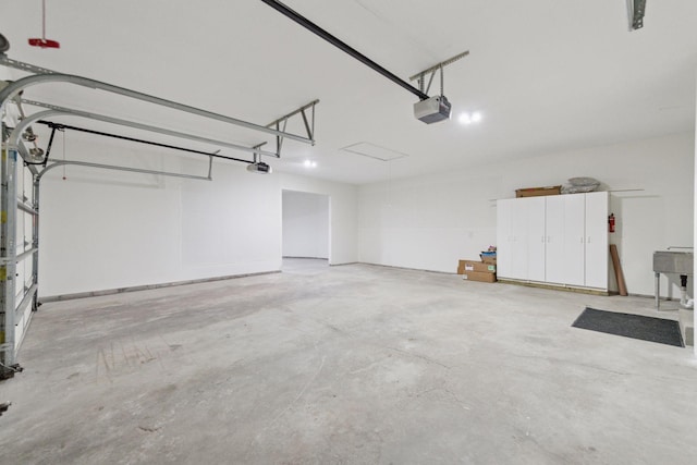 2324 Rivendell Ln, Minnetonka, MN 55305 - garage featuring a garage door opener