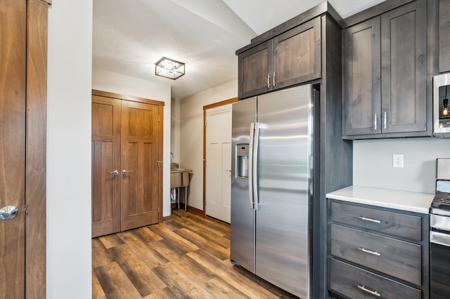 26884 709th St, Lake City, MN 55041 - kitchen with stainless steel appliances, light countertops, and wood finished floors