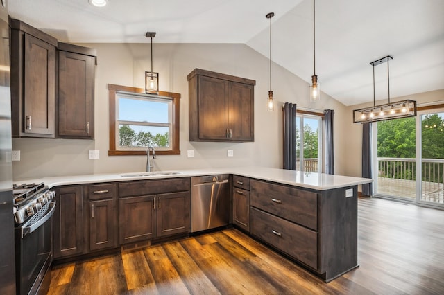 26884 709th St, Lake City, MN 55041 - kitchen with stainless steel appliances, vaulted ceiling, a peninsula, light countertops, and dark wood finished floors