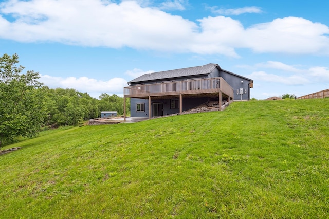 26884 709th St, Lake City, MN 55041 - back of house featuring a deck, a lawn, and a patio