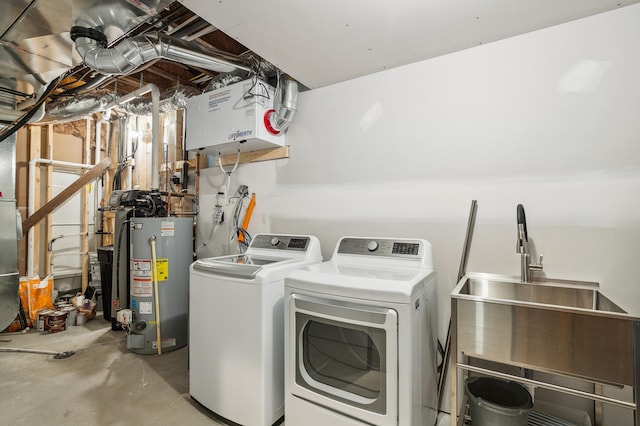 26884 709th St, Lake City, MN 55041 - washroom with gas water heater and independent washer and dryer