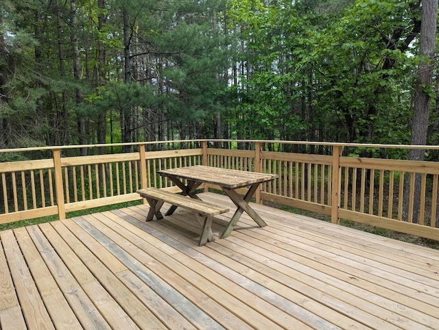24863 Norway Pine Pl, Ross Lake Twp, MN 56447 - wooden terrace featuring outdoor dining area