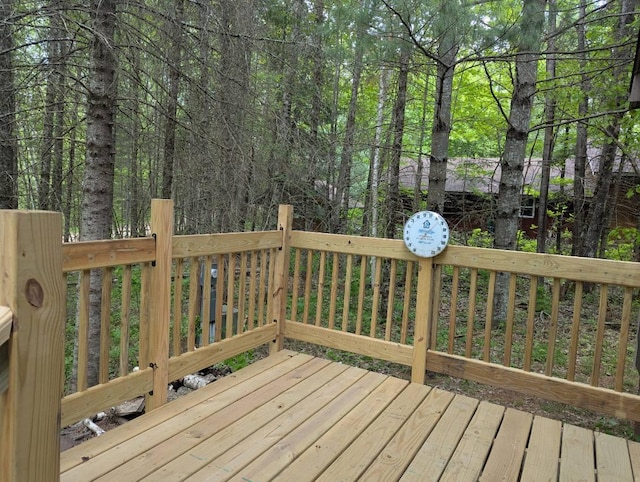24863 Norway Pine Pl, Ross Lake Twp, MN 56447 - wooden terrace with a forest view