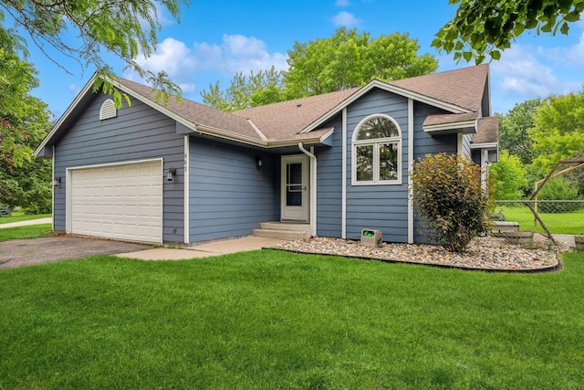 903 6th Ave NW, Buffalo, MN 55313 - ranch-style home with an attached garage, roof with shingles, and driveway