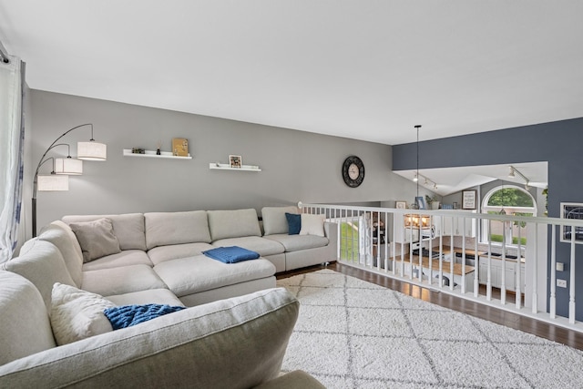 903 6th Ave NW, Buffalo, MN 55313 - living area with wood finished floors and lofted ceiling