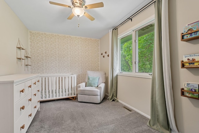 903 6th Ave NW, Buffalo, MN 55313 - carpeted bedroom with a nursery area and ceiling fan