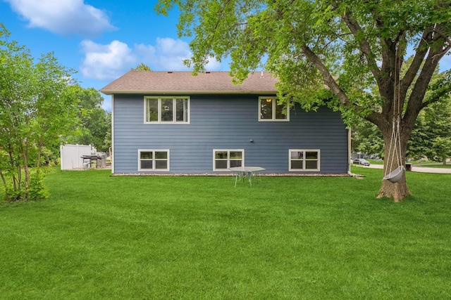 903 6th Ave NW, Buffalo, MN 55313 - rear view of property with a yard