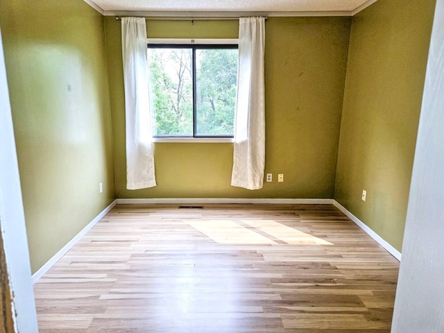 7635 Wedgewood Ct N, Maple Grove, MN 55311 - empty room with baseboards and wood finished floors