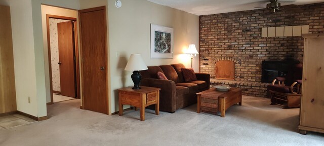 12183 Crooked Lake Ln SW, Moe Twp, MN 56327 - living area with a ceiling fan, light carpet, a fireplace, and baseboards