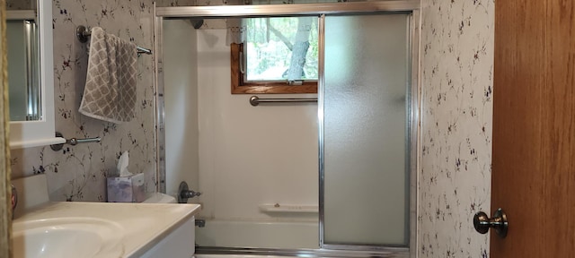 12183 Crooked Lake Ln SW, Moe Twp, MN 56327 - full bath featuring wallpapered walls, enclosed tub / shower combo, and vanity