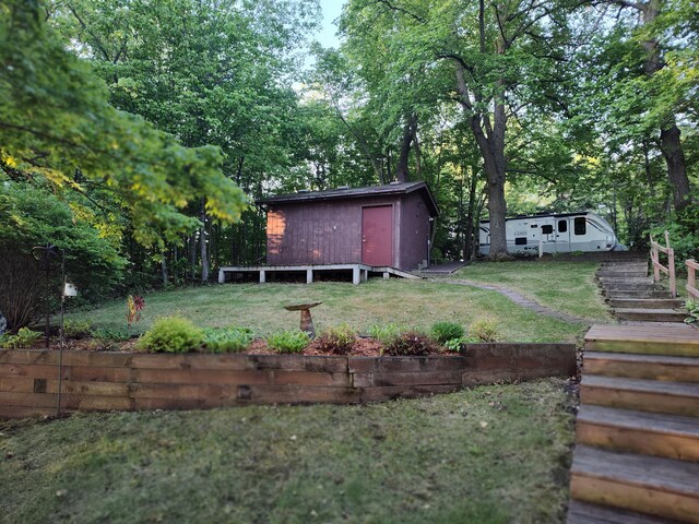 12183 Crooked Lake Ln SW, Moe Twp, MN 56327 - view of grassy yard with stairway