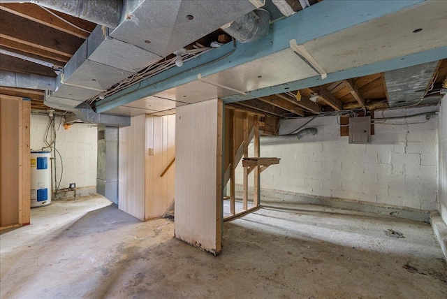 543 Pearl St, River Falls, WI 54022 - unfinished below grade area featuring electric water heater and electric panel