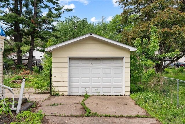 543 Pearl St, River Falls, WI 54022 - detached garage featuring concrete driveway