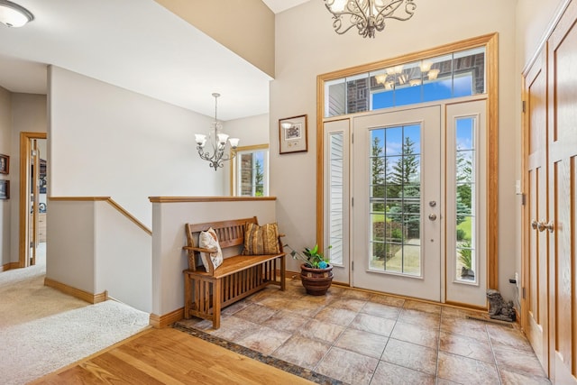 26033 607th St, Mantorville, MN 55955 - entryway featuring a chandelier and baseboards