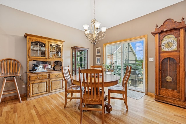 26033 607th St, Mantorville, MN 55955 - dining area with light wood-style flooring and a chandelier