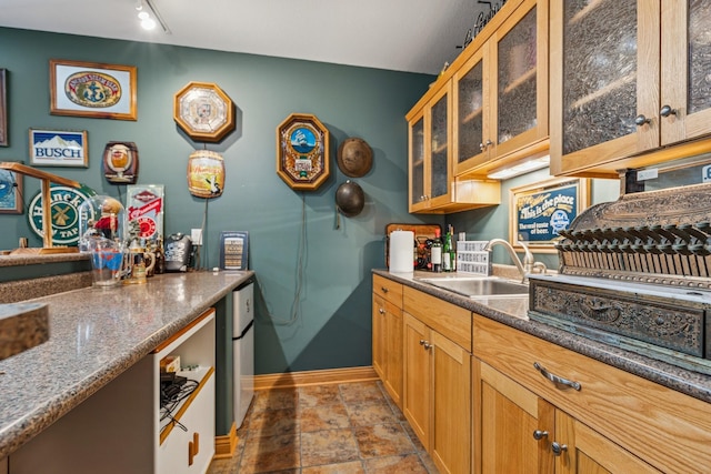 26033 607th St, Mantorville, MN 55955 - kitchen with stone finish flooring and glass insert cabinets