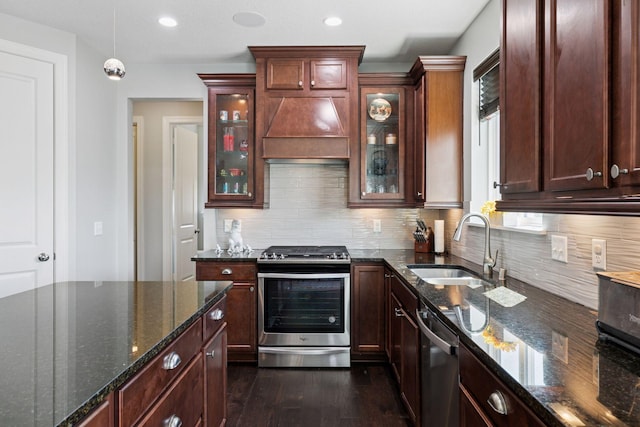 3751 Crane Island Ct, Minnetrista, MN 55331 - kitchen featuring appliances with stainless steel finishes, a sink, premium range hood, dark wood-style floors, and tasteful backsplash