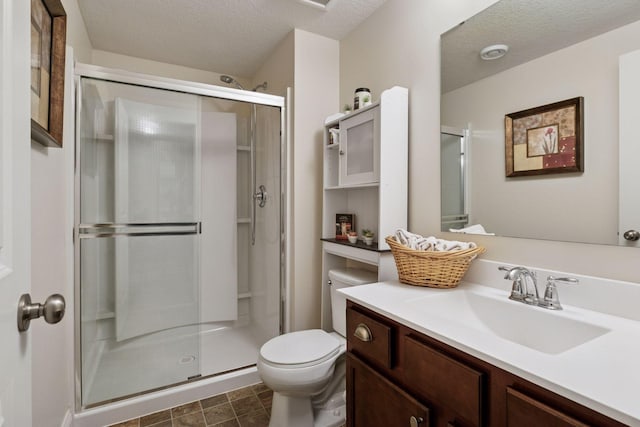 3751 Crane Island Ct, Minnetrista, MN 55331 - full bath with vanity, a shower stall, toilet, and a textured ceiling