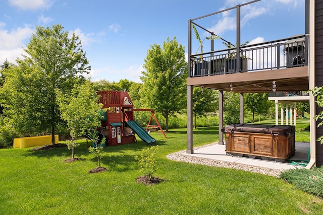 3751 Crane Island Ct, Minnetrista, MN 55331 - view of green lawn featuring a hot tub and a playground