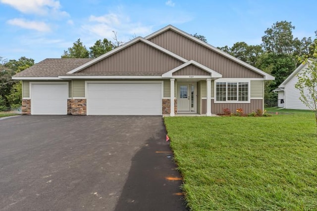 TBD Lynndale Dr, Baxter, MN 56401 - view of front of property with driveway, a front lawn, a garage, and a shingled roof