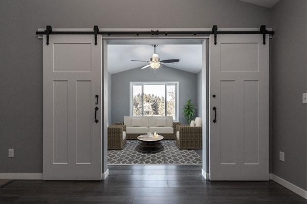 TBD Lynndale Dr, Baxter, MN 56401 - entrance foyer with a barn door, lofted ceiling, ceiling fan, dark wood-style flooring, and baseboards