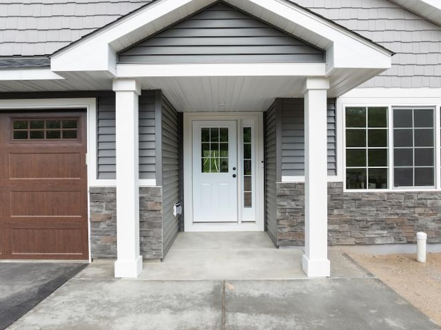 TBD Lynndale Dr, Baxter, MN 56401 - property entrance with stone siding and a garage