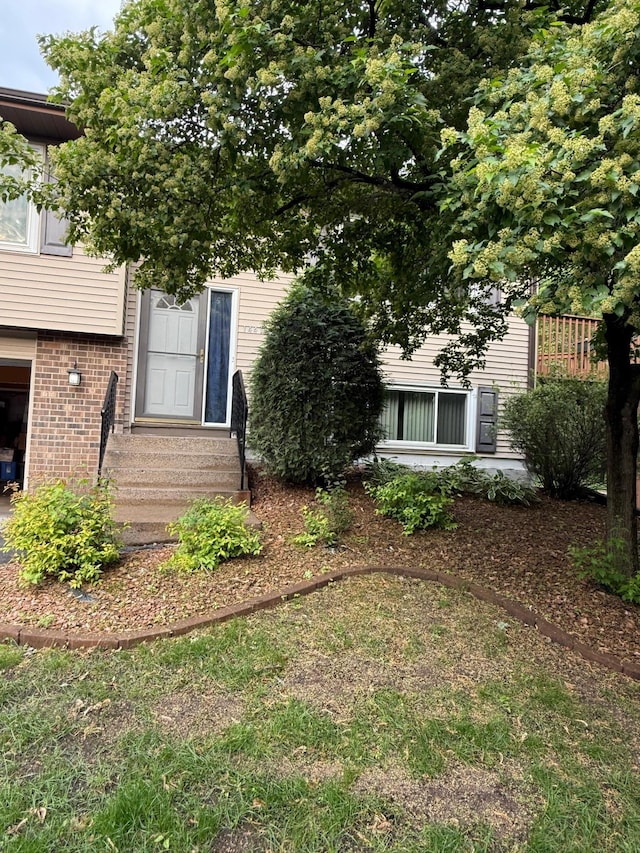 14410 92nd Ave N, Maple Grove, MN 55369 - view of front of property featuring entry steps and brick siding