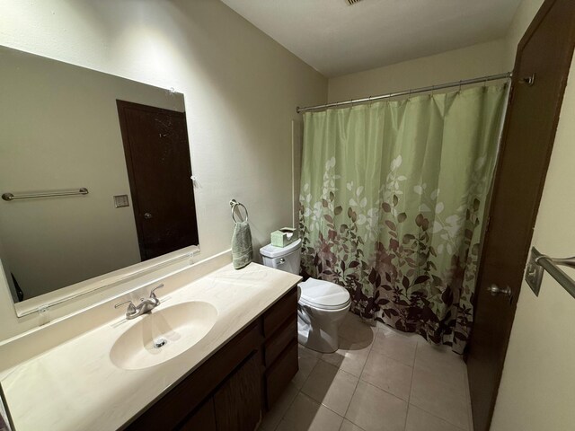 14410 92nd Ave N, Maple Grove, MN 55369 - bathroom with vanity, toilet, and tile patterned flooring