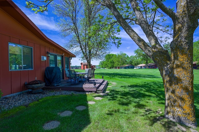 3865 Wahtomin Trl NW, Alexandria, MN 56308 - view of green lawn featuring a wooden deck